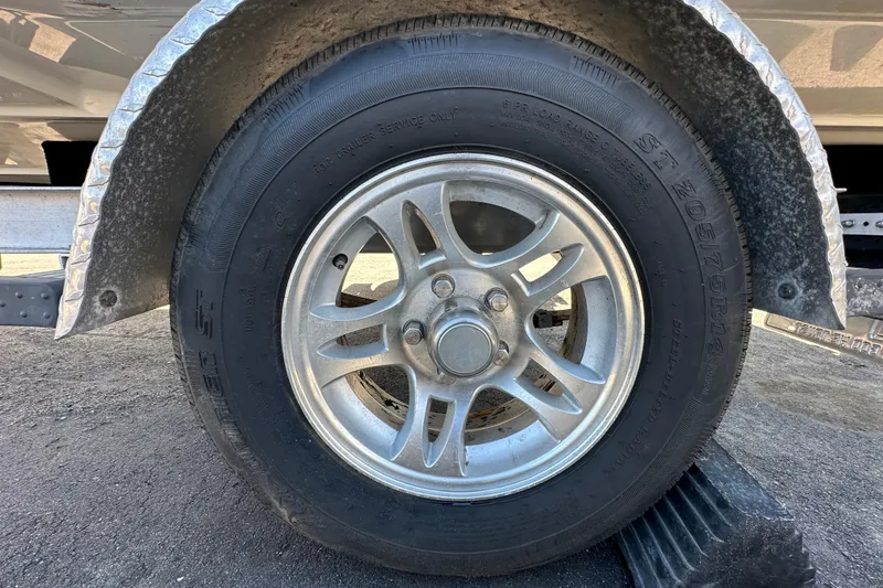 Slide: The Image of Close-up of Yamaha VF115XA engine label on 2022 NauticStar 195 XTS boat. - 91