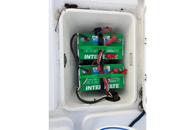 Slide: The Image of Two Interstate deep cycle batteries in a 2006 Century 3200 Center Console boat. - 24