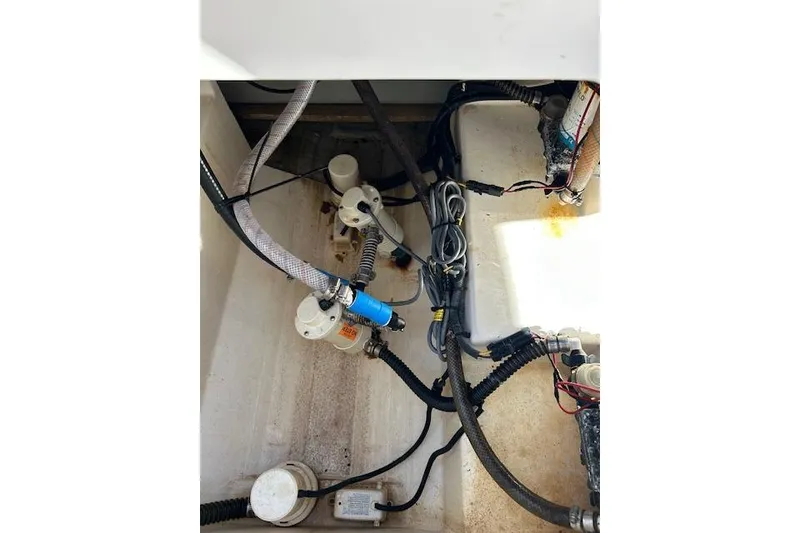 Slide: The Image of 2006 Century 3200 Center Console boat wiring and plumbing components. - 26