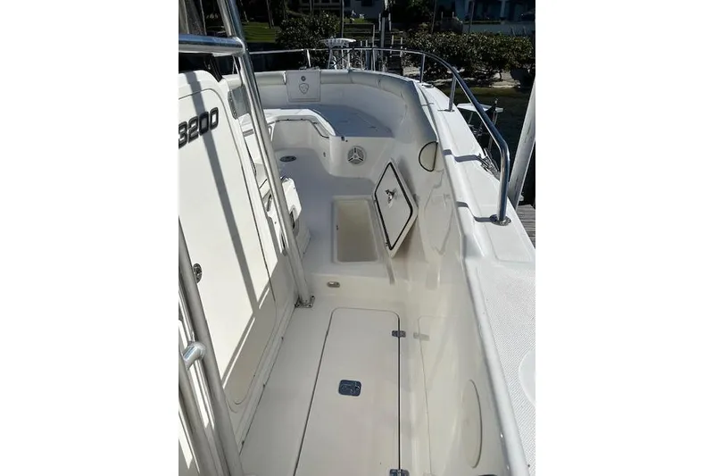 Slide: The Image of 2006 Century 3200 Center Console boat interior with open storage compartments. - 36