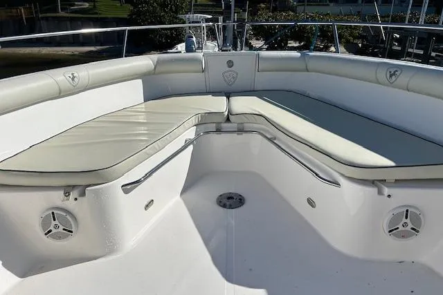 Slide: The Image of 2006 Century 3200 Center Console boat with cushioned seating and speakers. - 37