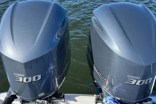Slide: The Image of Twin Yamaha 300 outboard motors on a 2006 Century 3200 Center Console boat. - 43