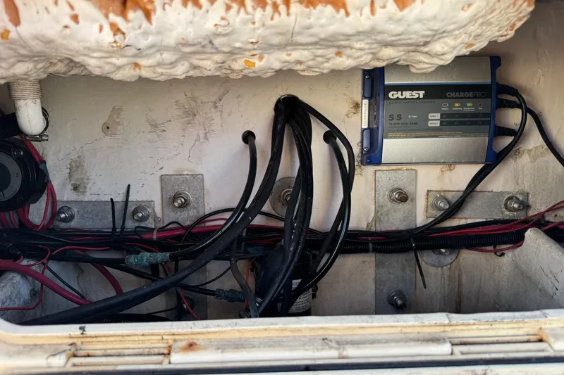 Slide: The Image of 2001 Sport-Craft 260 Center Console boat wiring and battery charger setup. - 28