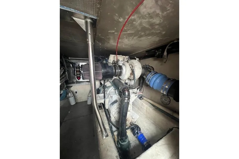 Slide: The Image of Interior of 1996 Ocean Yachts 48 Super Sport with beige seating and large windows. - 12