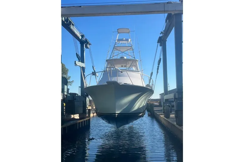 Slide: The Image of Luxurious kitchen interior of 1996 Ocean Yachts 48 Super Sport with modern amenities. - 15