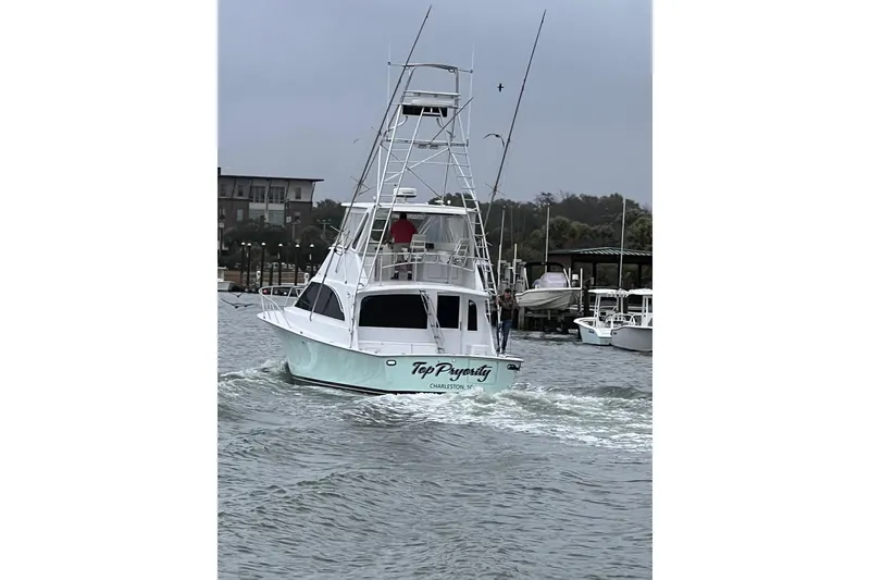 Slide: The Image of Open storage compartments on a 1996 Ocean Yachts 48 Super Sport boat deck. - 55