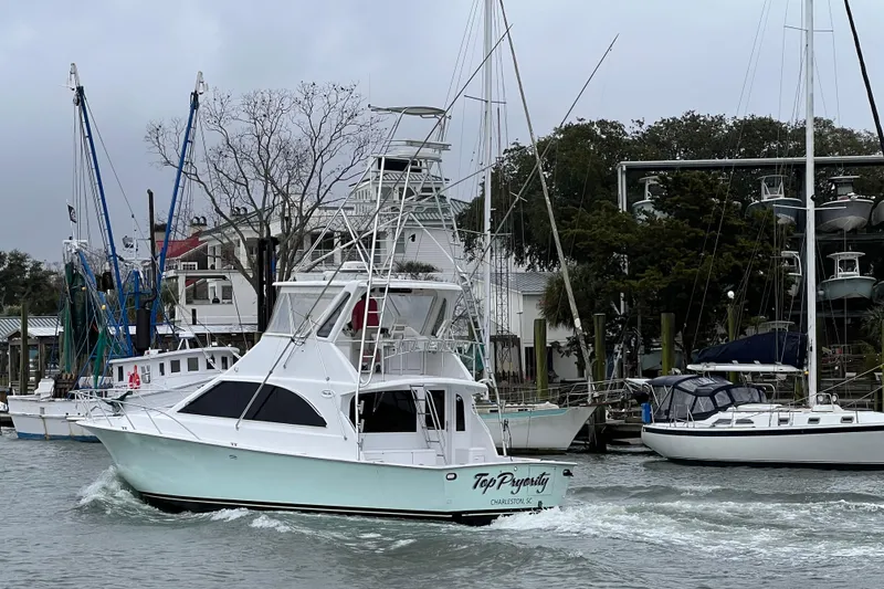 Slide: The Image of 1996 Ocean Yachts 48 Super Sport boat deck with harbor view. - 56