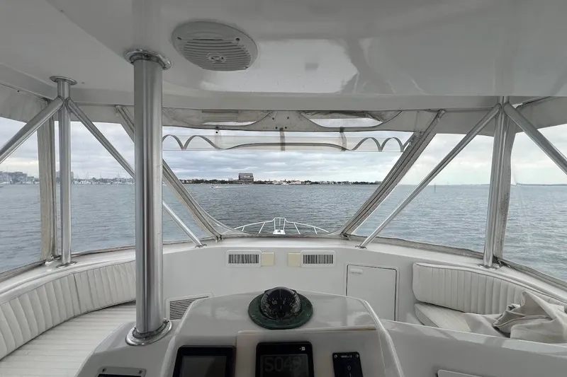 Slide: The Image of Interior of 1996 Ocean Yachts 48 Super Sport with modern kitchen and seating area. - 9