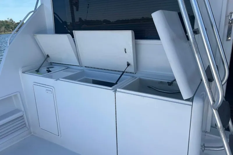 Slide: The Image of Compact bathroom in 1996 Ocean Yachts 48 Super Sport with wooden flooring. - 19