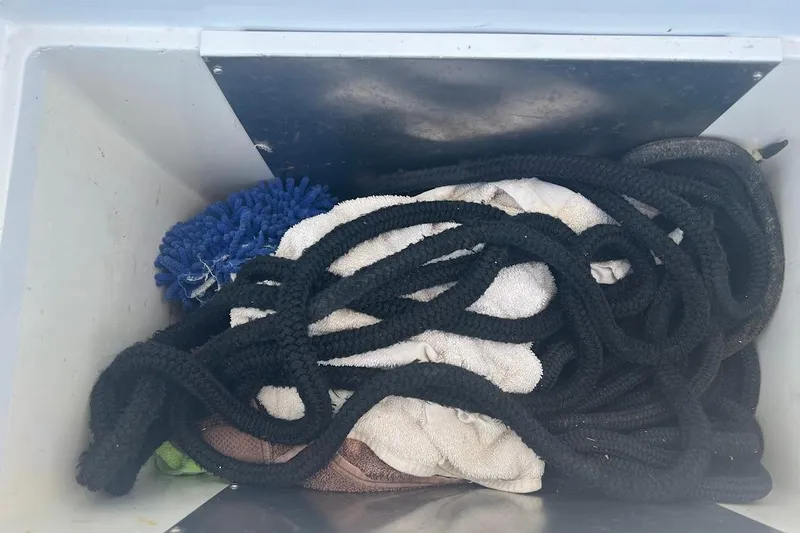 Slide: The Image of Interior cabin of 1996 Ocean Yachts 48 Super Sport with bunk bed and storage drawers. - 21