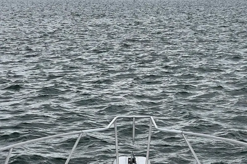 Slide: The Image of Luxurious interior of 1996 Ocean Yachts 48 Super Sport with seating, TV, and kitchenette. - 4