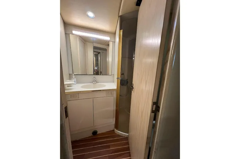 Slide: The Image of Cockpit view of 1996 Ocean Yachts 48 Super Sport with navigational instruments. - 50