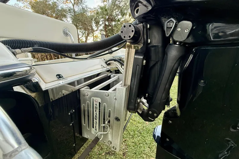 Slide: The Image of 2012 ShearWater 25LTZ boat engine detail with hydraulic components. - 17