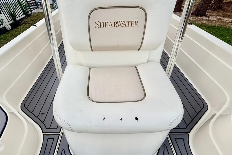 Slide: The Image of White ShearWater 25LTZ boat seat, 2012 model, with minor wear on cushion. - 35