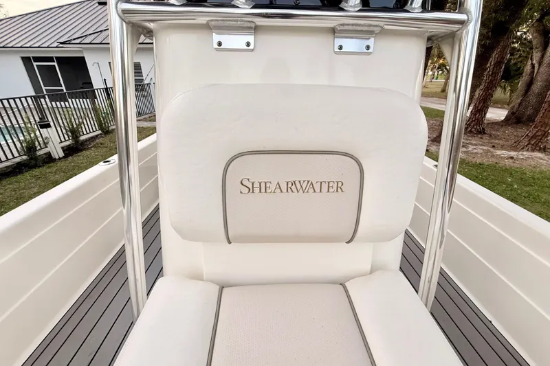 Slide: The Image of ShearWater 25LTZ 2012 boat interior with branded seat and stainless steel frame. - 36