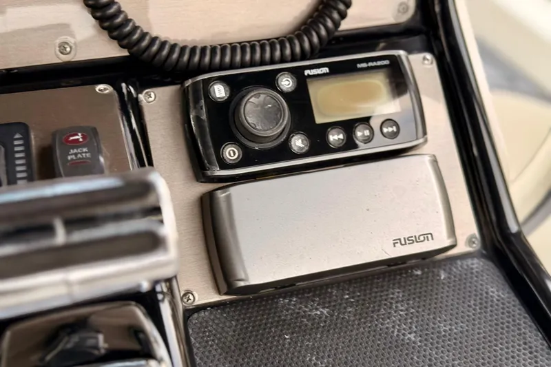 Slide: The Image of Fusion marine stereo system on 2012 ShearWater 25LTZ boat dashboard. - 51