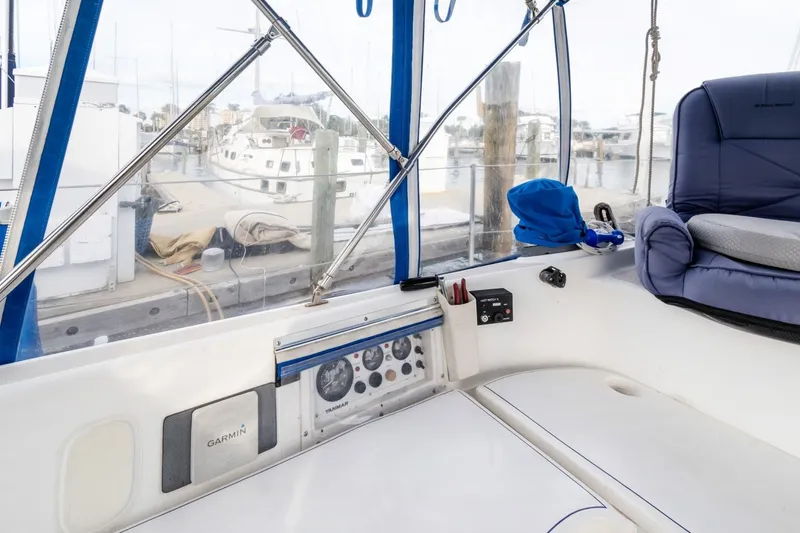 Slide: The Image of Interior view of a 1987 Morgan 41 Out Island Classic sailboat cockpit with navigation equipment. - 11