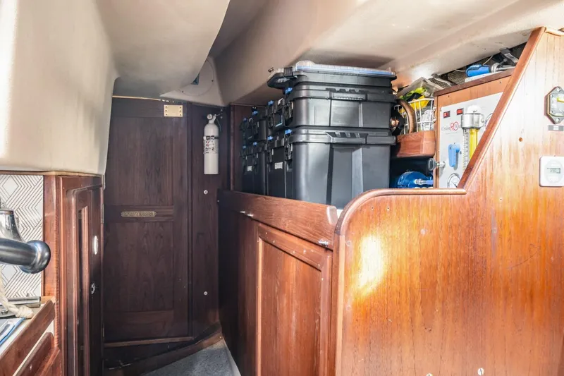 Slide: The Image of Interior of 1987 Morgan 41 Out Island Classic yacht with storage and equipment. - 21