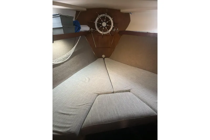 Slide: The Image of Interior cabin of 1987 Morgan 41 Out Island Classic sailboat with cozy bedding. - 35