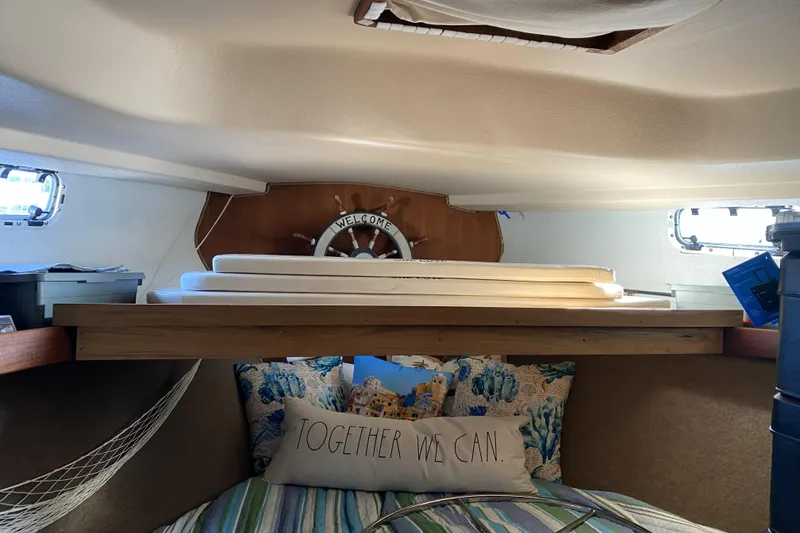 Slide: The Image of Cozy cabin interior of 1987 Morgan 41 Out Island Classic sailboat with nautical decor. - 36