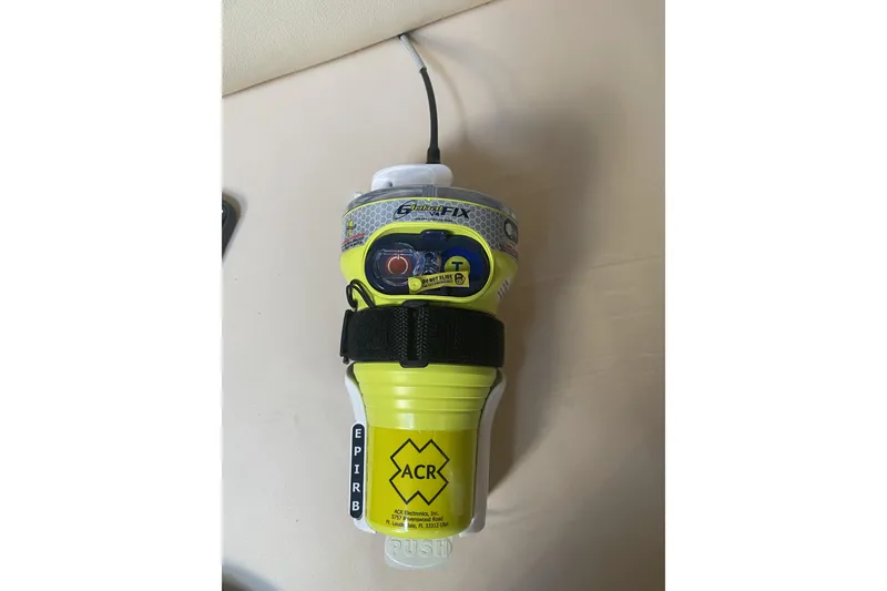 Slide: The Image of Yellow ACR EPIRB device on a 1987 Morgan 41 Out Island Classic yacht. - 45
