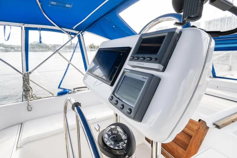 Slide: The Image of Cockpit of 1987 Morgan 41 Out Island Classic with navigation instruments and compass. - 7