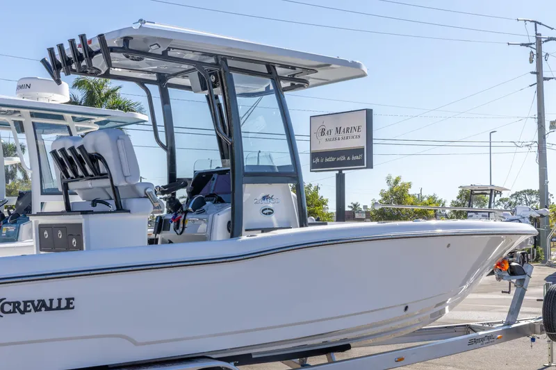 Slide: The Image of 2026 Crevalle 26 HCO boat on trailer at Bay Marine dealership. - 10