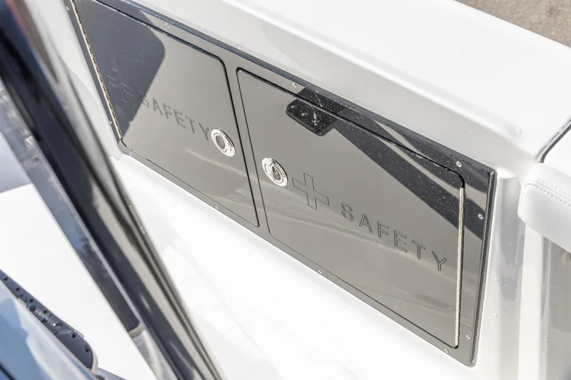 Slide: The Image of Safety compartment on 2026 Crevalle 26 HCO boat, featuring secure storage. - 17