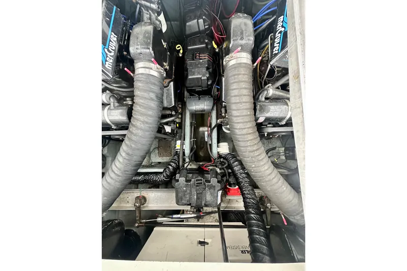 Slide: The Image of Engine compartment of a 1997 Carver 320 Voyager with MerCruiser components. - 32