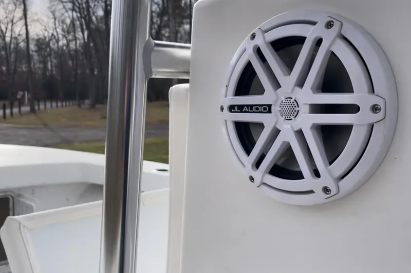 Slide: The Image of 2024 C-Hawk 23 Center Console with JL Audio speaker on deck. - 9
