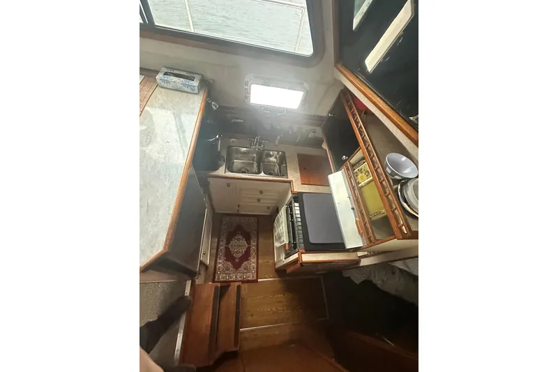 Slide: The Image of Interior view of Campion 310 yacht kitchen, 1982 model. - 19