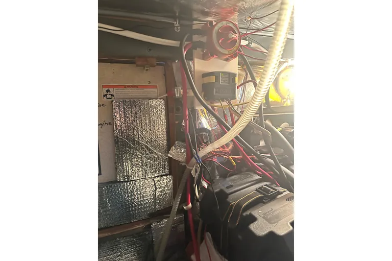 Slide: The Image of Electrical wiring and components inside a 1982 Campion 310 boat. - 50