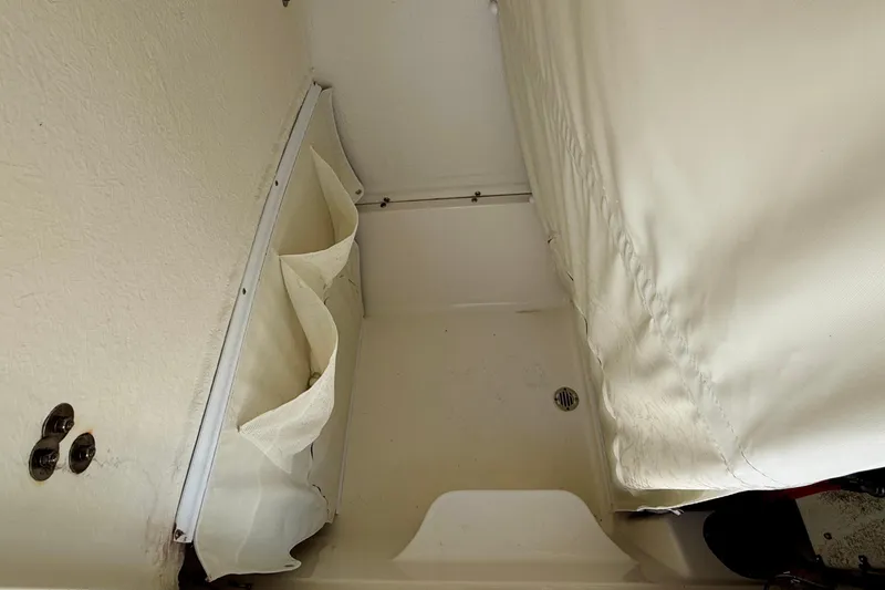 Slide: The Image of Interior storage compartment of 2023 Key West 263 FS boat. - 24