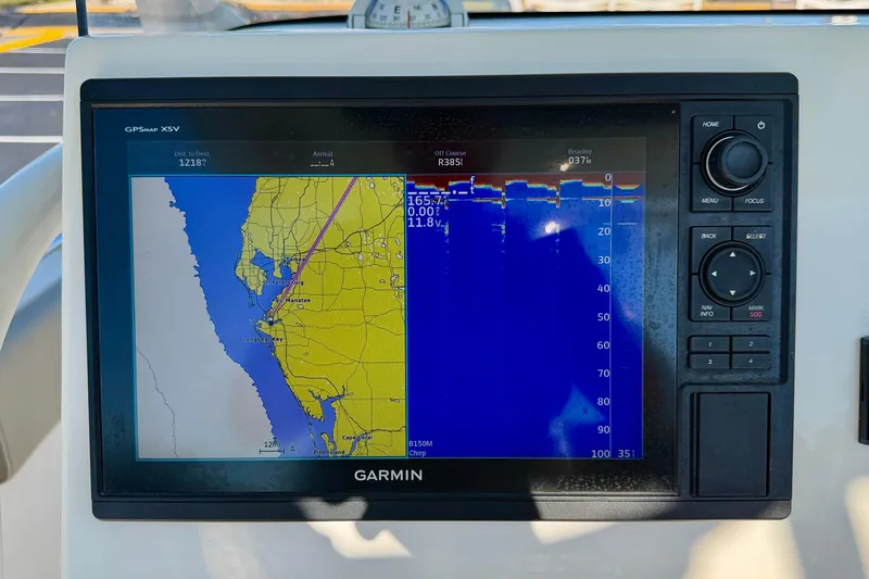 Slide: The Image of Garmin GPS display on 2023 Key West 263 FS boat dashboard. - 30