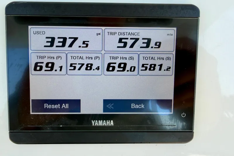 Slide: The Image of Display screen showing fuel usage and trip data for 2023 Key West 263 FS boat. - 32