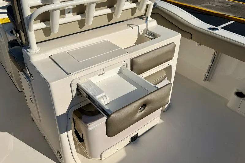 Slide: The Image of 2023 Key West 263 FS boat interior with storage compartments and seating. - 36