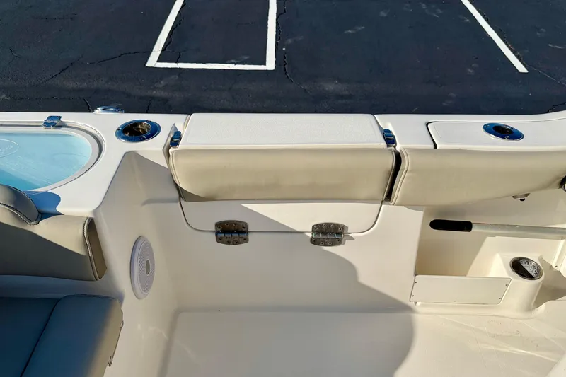 Slide: The Image of 2023 Key West 263 FS boat interior with seating and cup holders. - 51