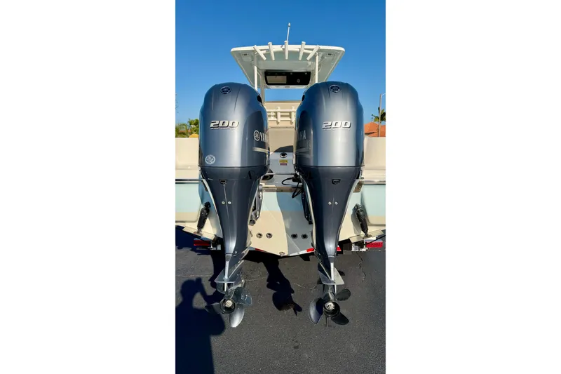 Slide: The Image of 2023 Key West 263 FS boat with dual Yamaha 200 outboard engines. - 56