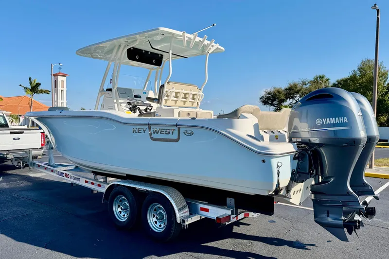 Slide: The Image of 2023 Key West 263 FS boat on trailer with Yamaha outboard motor. - 7