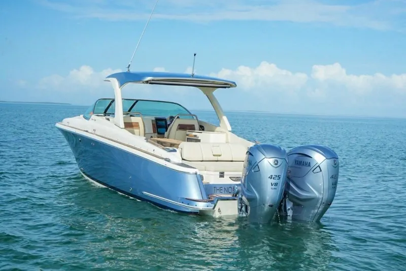 Slide: The Image of 2019 Chris-Craft Launch 35 GT OB boat with twin Yamaha 425 V8 engines on open water. - 16