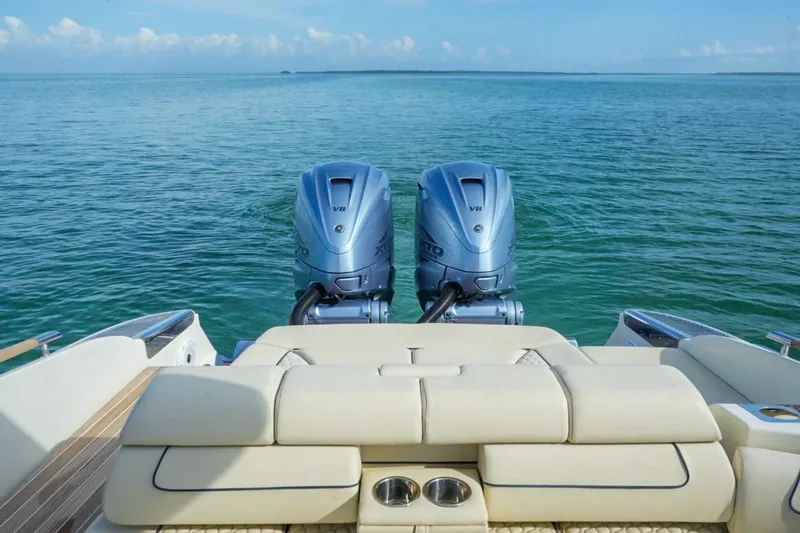 Slide: The Image of 2019 Chris-Craft Launch 35 GT OB with dual outboard engines on open water. - 26