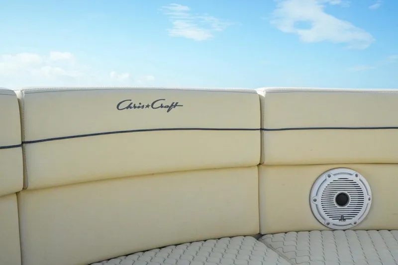 Slide: The Image of 2019 Chris-Craft Launch 35 GT OB boat interior with speaker and logo. - 27