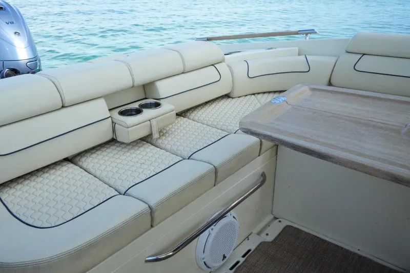 Slide: The Image of Luxurious seating area on 2019 Chris-Craft Launch 35 GT OB boat with cup holders. - 29