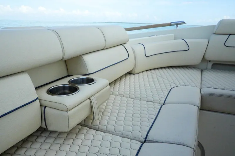 Slide: The Image of Luxurious seating on 2019 Chris-Craft Launch 35 GT OB with cup holders, ocean view. - 30