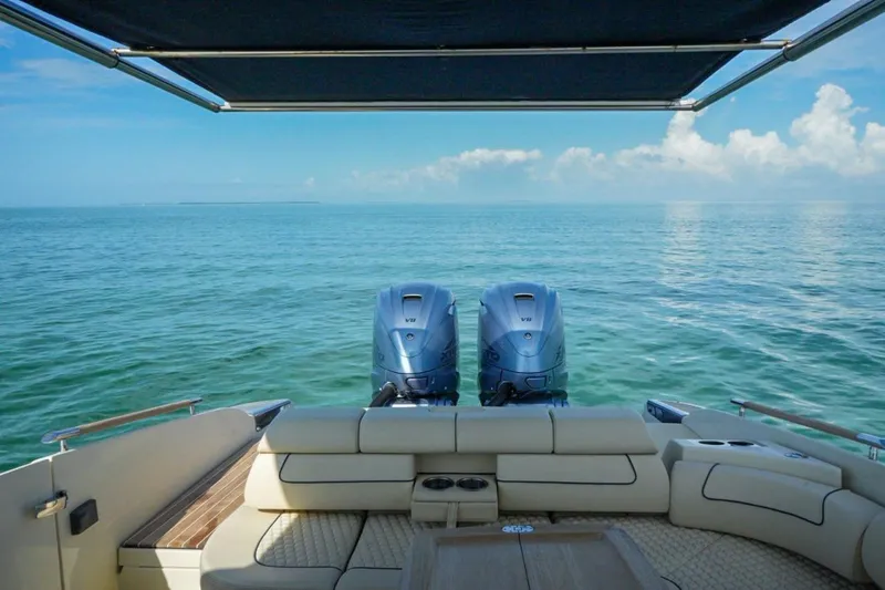 Slide: The Image of 2019 Chris-Craft Launch 35 GT OB boat with twin outboard engines on open sea. - 34