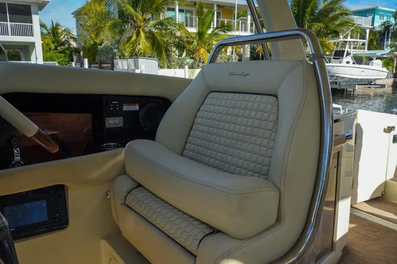 Slide: The Image of Luxurious 2019 Chris-Craft Launch 35 GT OB boat seat with elegant design and waterfront view. - 36