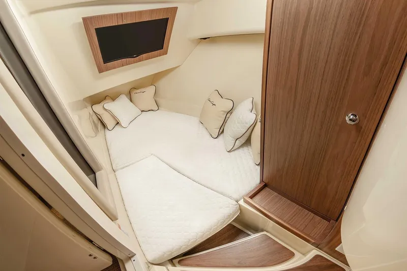 Slide: The Image of Manufacturer Provided Image: 2019 Chris-Craft Launch 35 GT OB cabin interior with bed and pillows. - 45