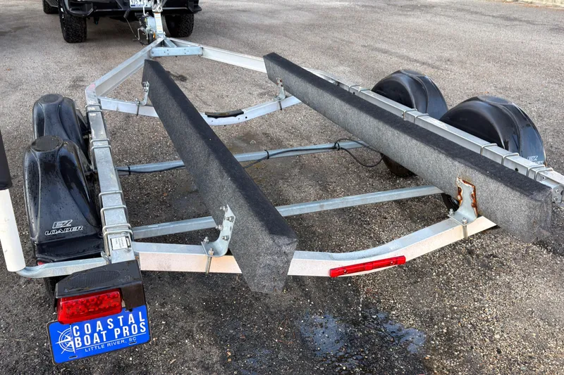 Slide: The Image of 2020 Stingray 212 SC boat with spacious seating and modern design. - 18