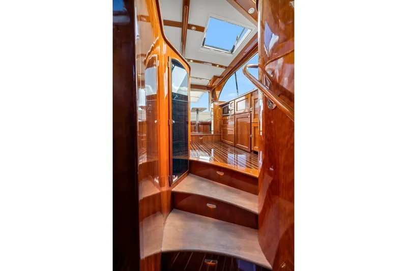 Slide: The Image of Luxurious interior of 2015 Hinckley Talaria 43 Motoryacht with polished wood finish. - 8