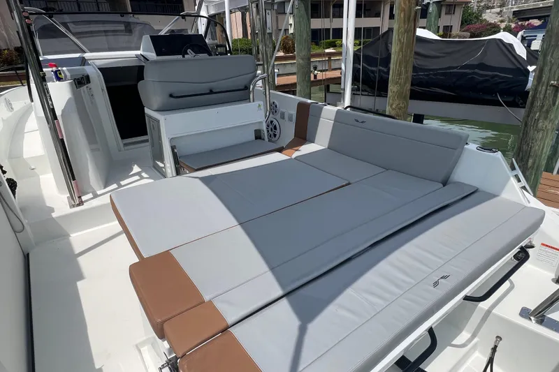 Slide: The Image of 2024 Beneteau Flyer 9 SUNdeck boat interior with spacious seating and modern design. - 14